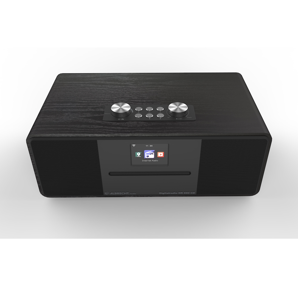 Czarny drewniany zestaw stereo z przyciskami i ekranem. Białe tło.