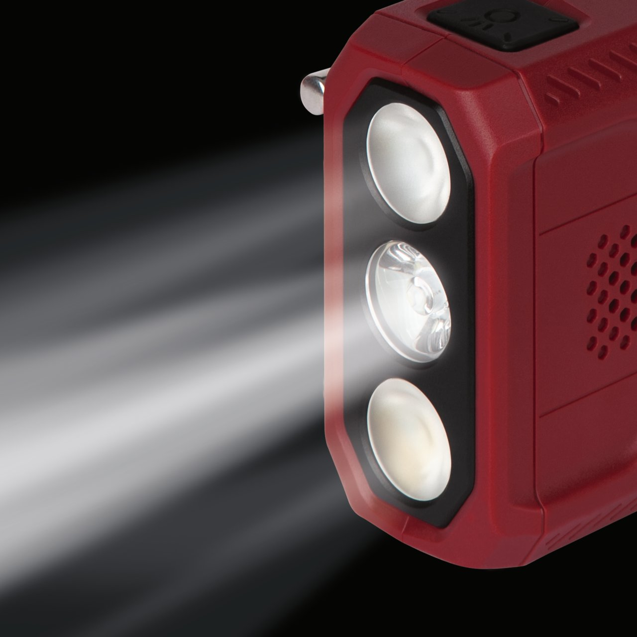 Rote Taschenlampe mit drei hellen Lichtern und einem Strahl nach links.