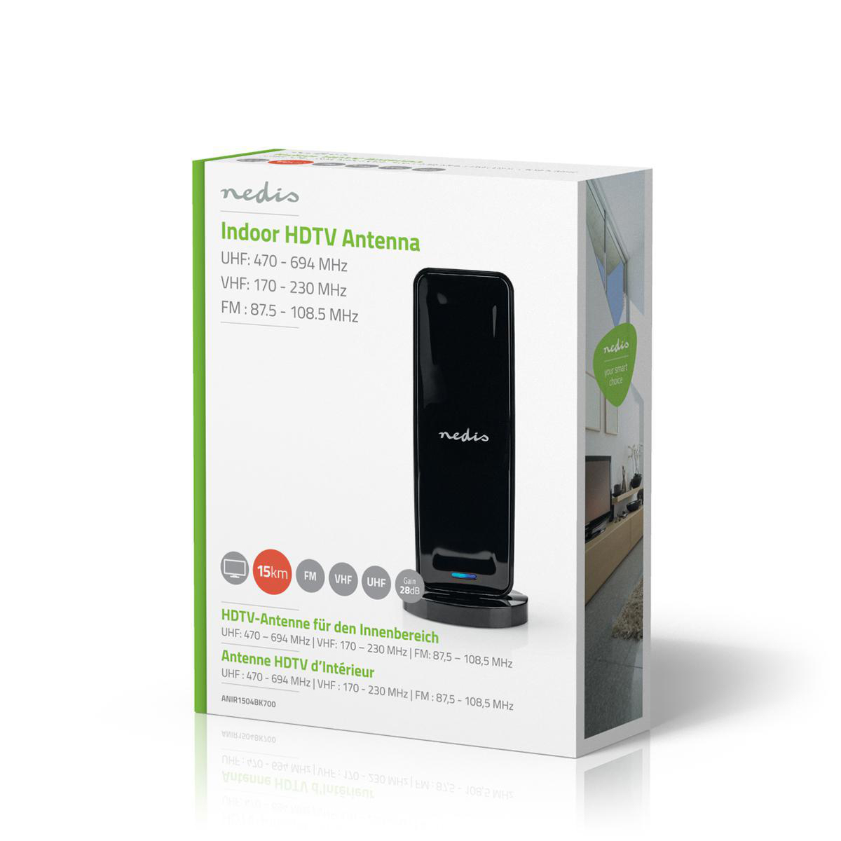 Witte en groene doos. Zwarte indoor HDTV-antenne vooraan.