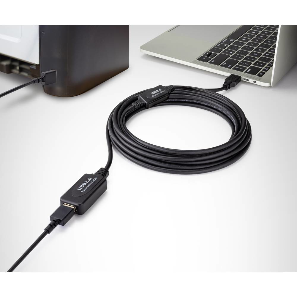 Cavo di prolunga USB nero, USB2.0, collegato a un laptop e a un disco rigido esterno, su una superficie chiara.
