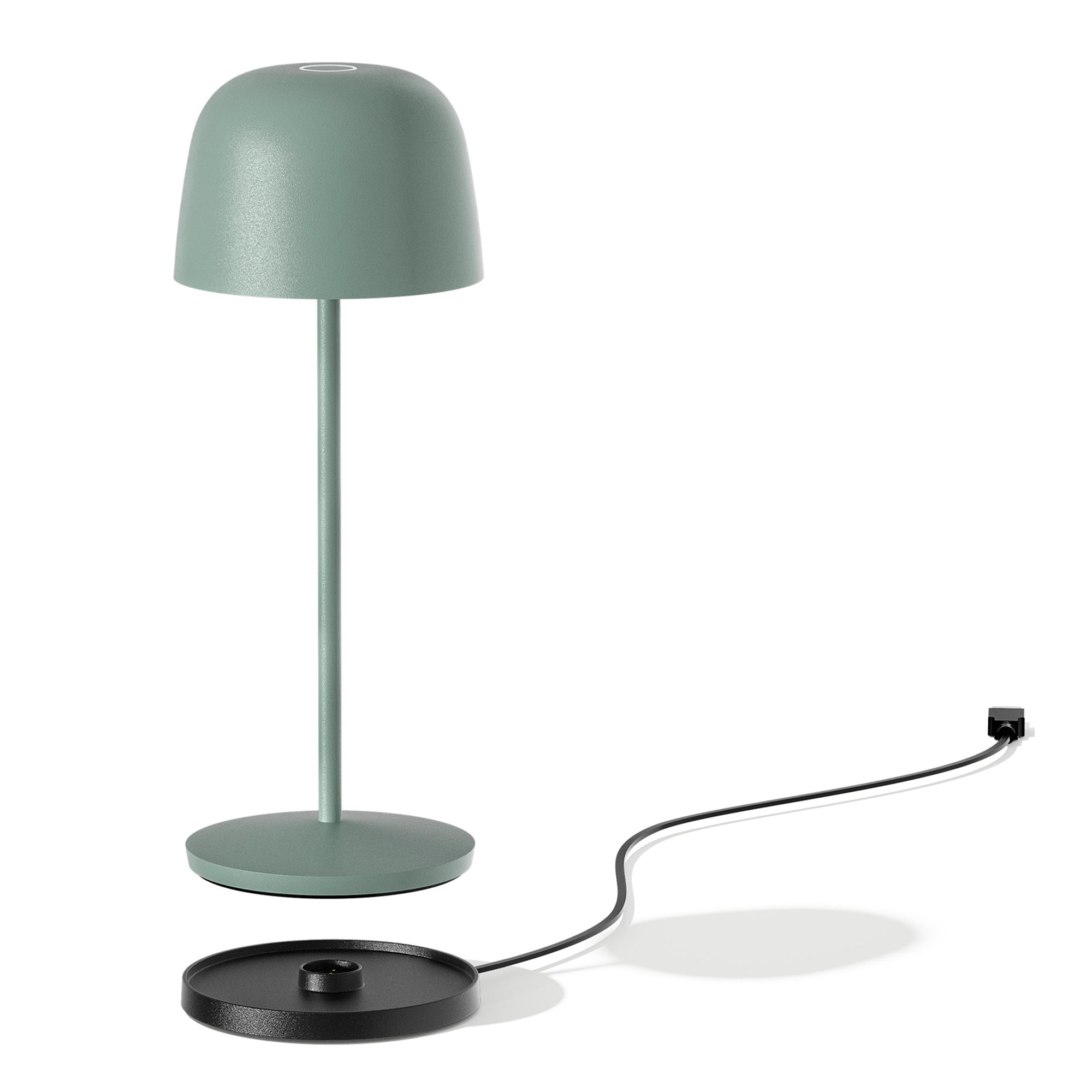 Eine grüne Tischlampe mit geschwungenem Schirm, schwarzem Fuß und Netzkabel.