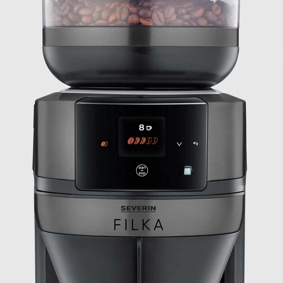 Primer plano de una cafetera gris oscuro con contenedor de granos de café y pantalla digital. Fondo blanco.