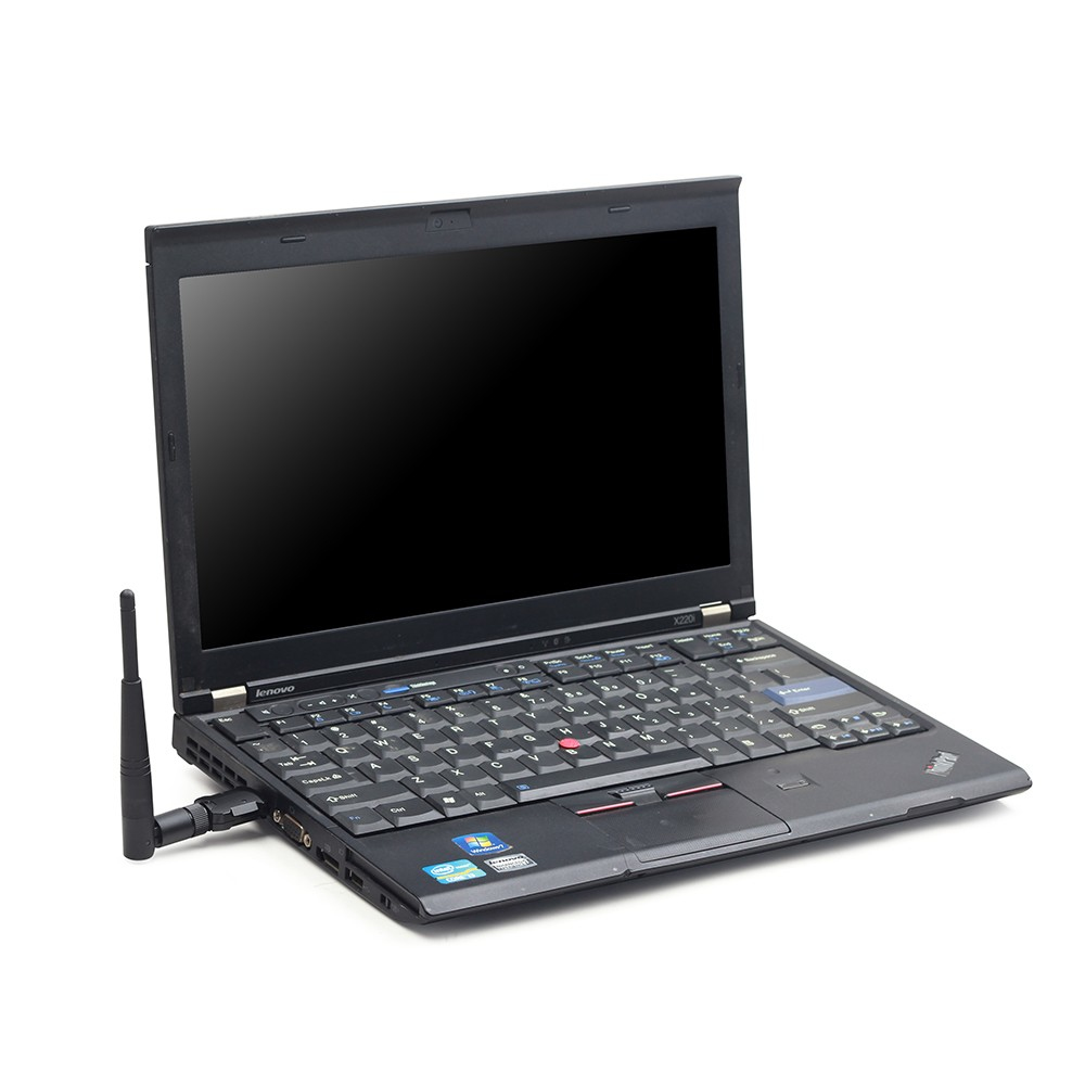 Black laptop with antenna connected to it.