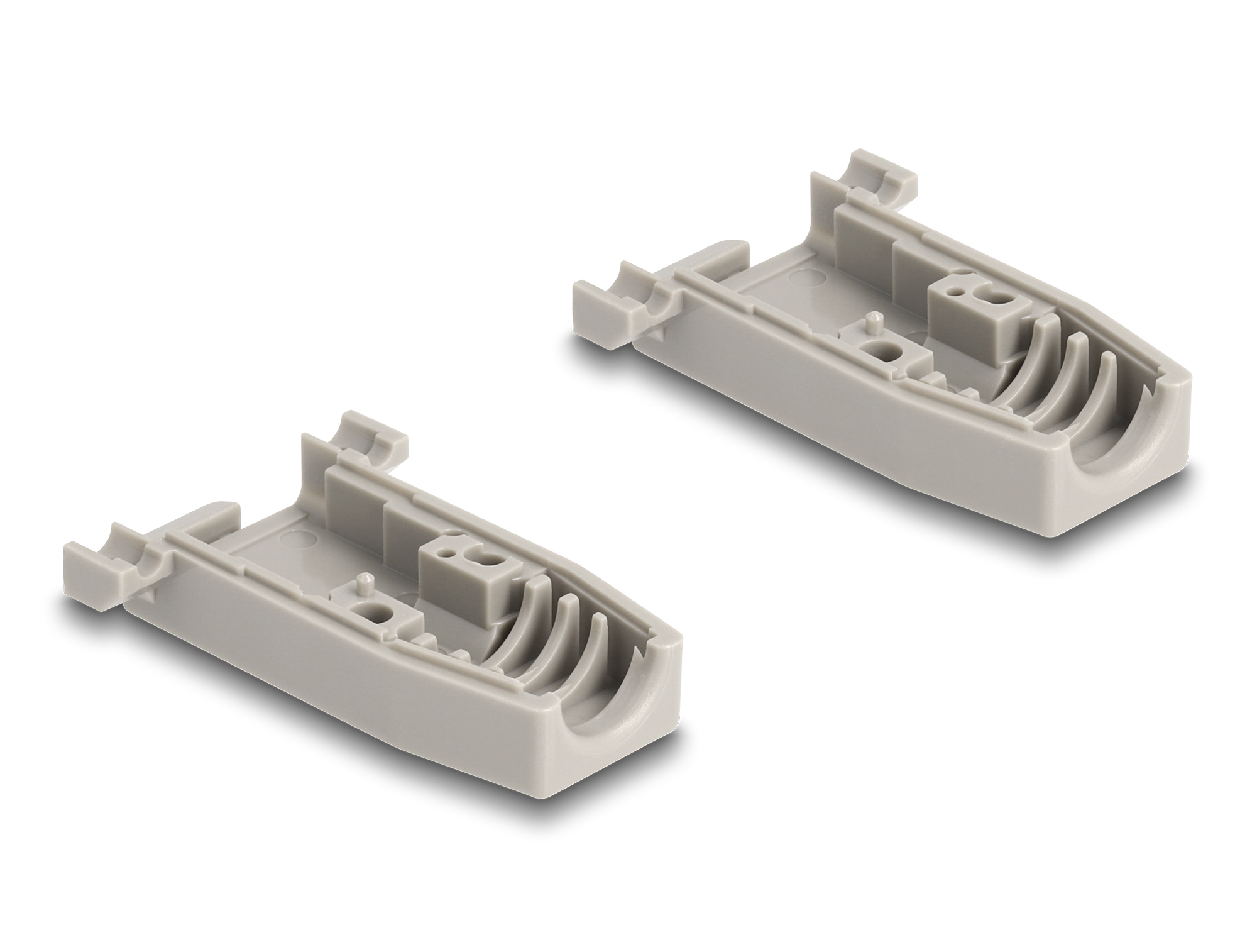 Dwa jasnoszare plastikowe elementy, prawdopodobnie z większego urządzenia, na białym tle.
