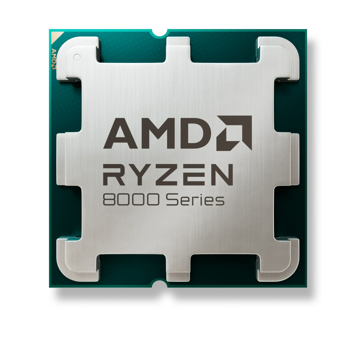 Procesor AMD Ryzen 8000 Series ze srebrnym rozpraszaczem ciepła, na zielonej płytce.