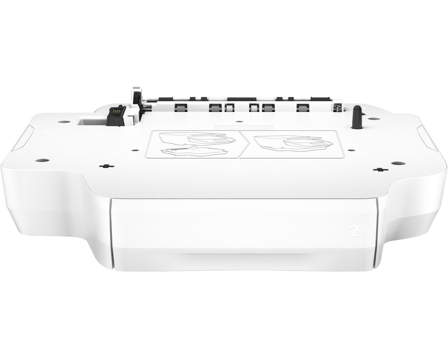 Białe urządzenie elektroniczne ze złączami i czarnym przyciskiem, z góry.