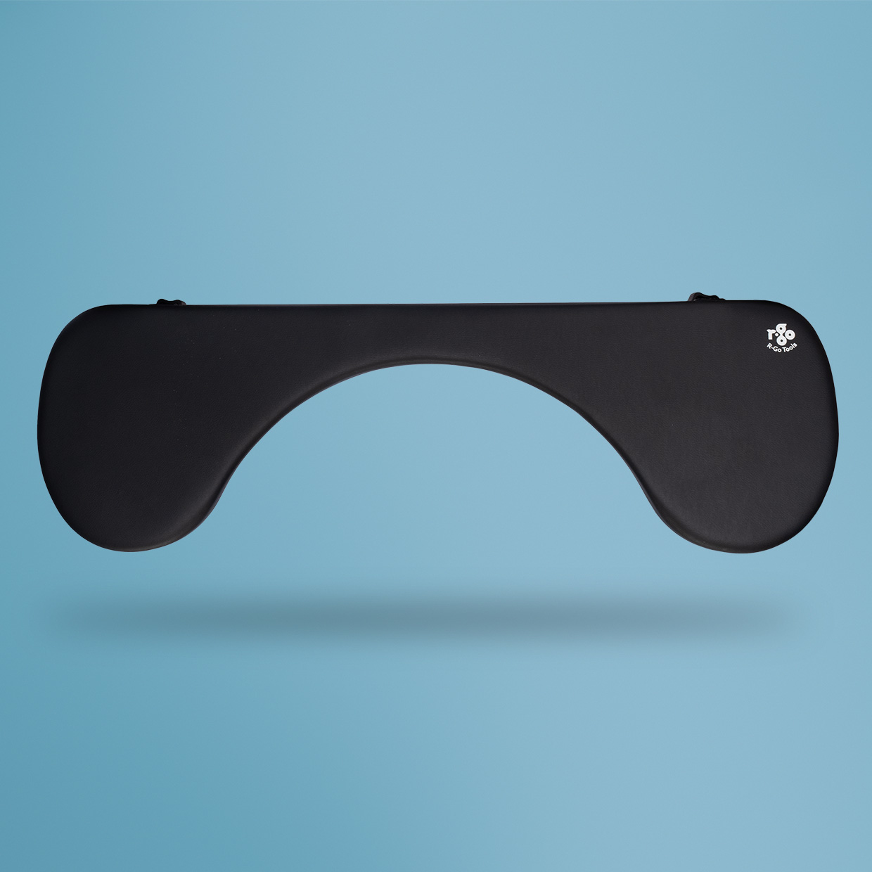 Black R80 e-Go table with a rounded top and cutout for user comfort on a blue background.