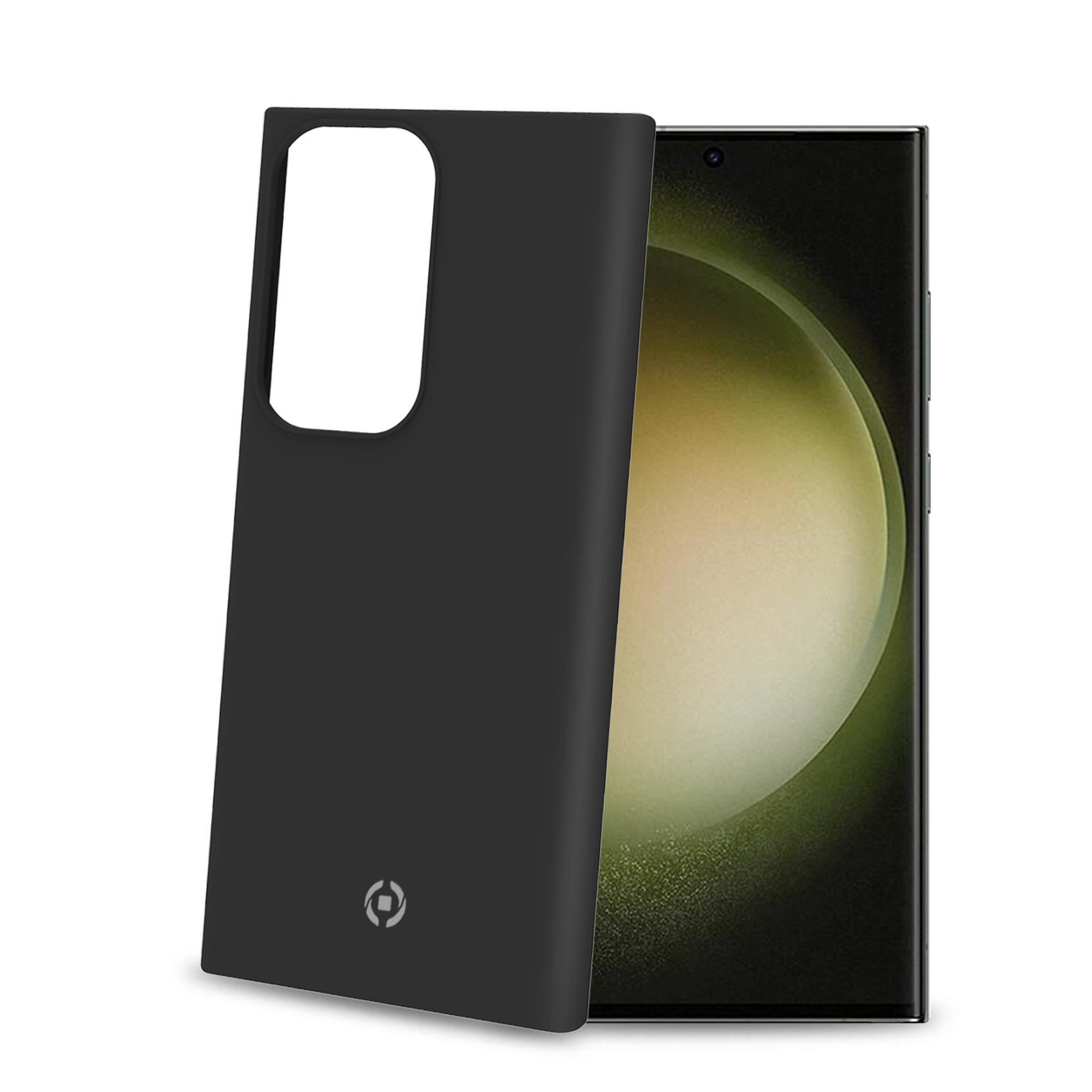 Schwarze Handyhülle neben einem Telefon. Eine Kamera ist sichtbar.