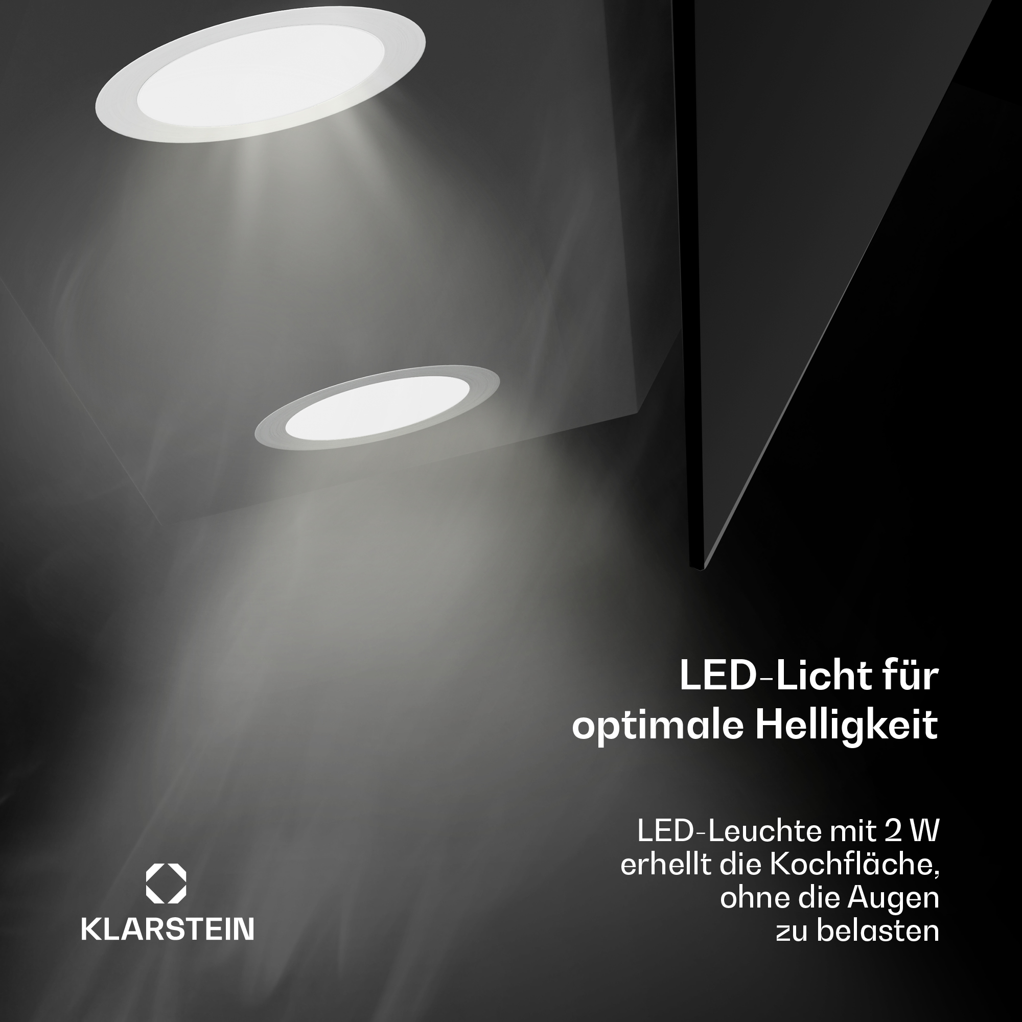Dos luces LED circulares iluminan un techo negro, con texto debajo.