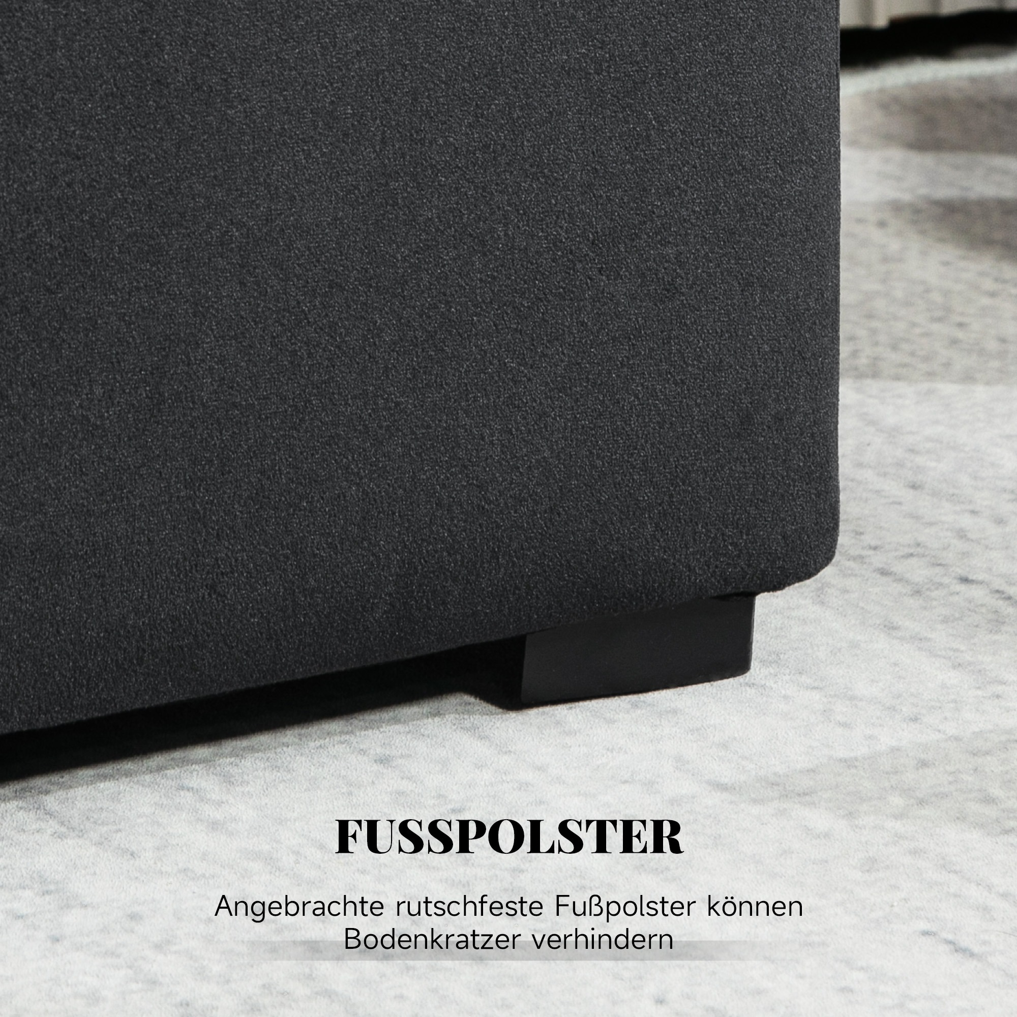 Dunkelgraue Sofabasis mit schwarzen Beinen. Text auf Deutsch sichtbar.