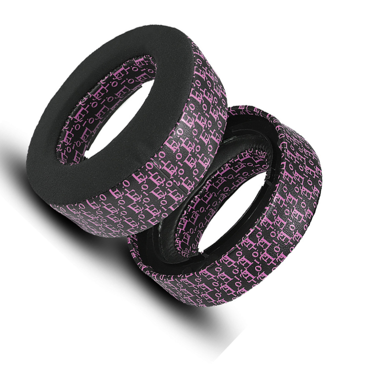 Due cuscinetti auricolari neri e rosa a fantasia.