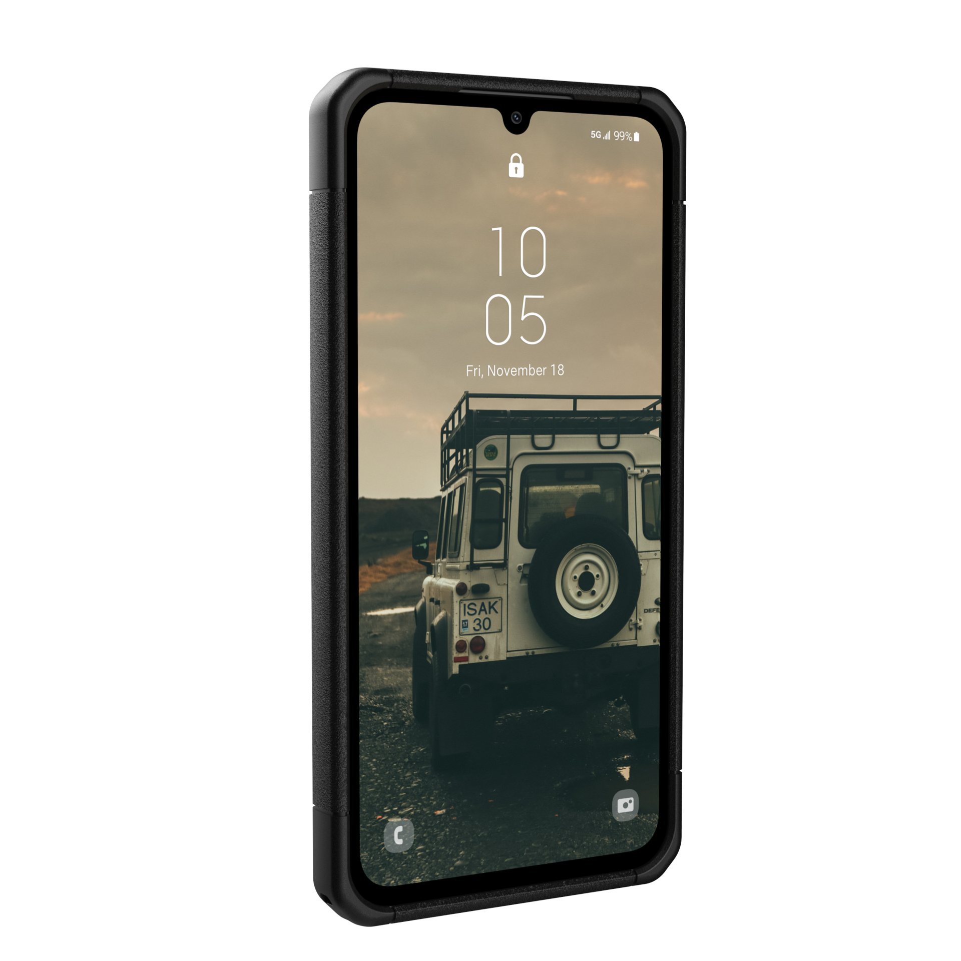 Black phone in a case displays a car on a road, the date is November 18.