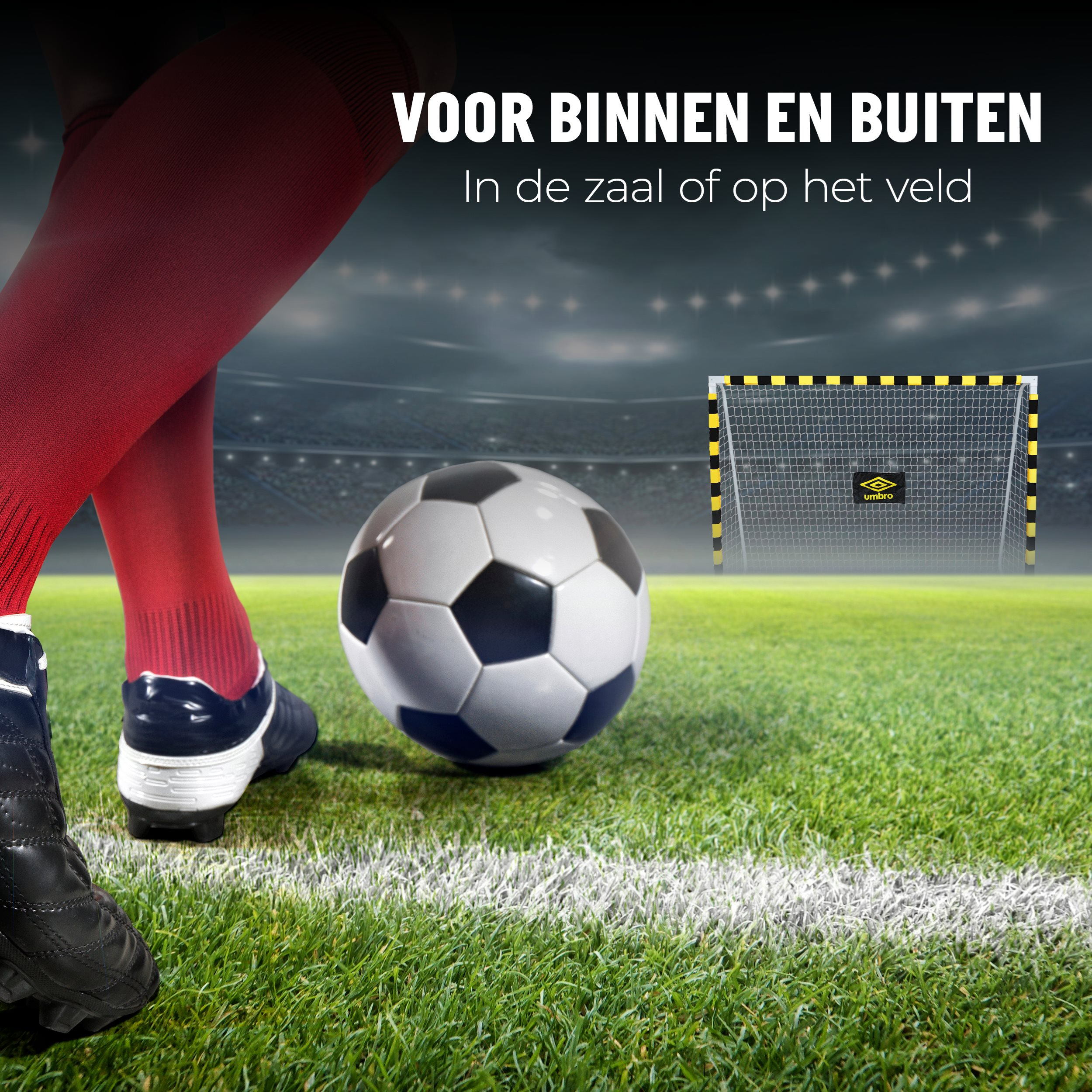 Soccer field with ball, goal, and player legs.