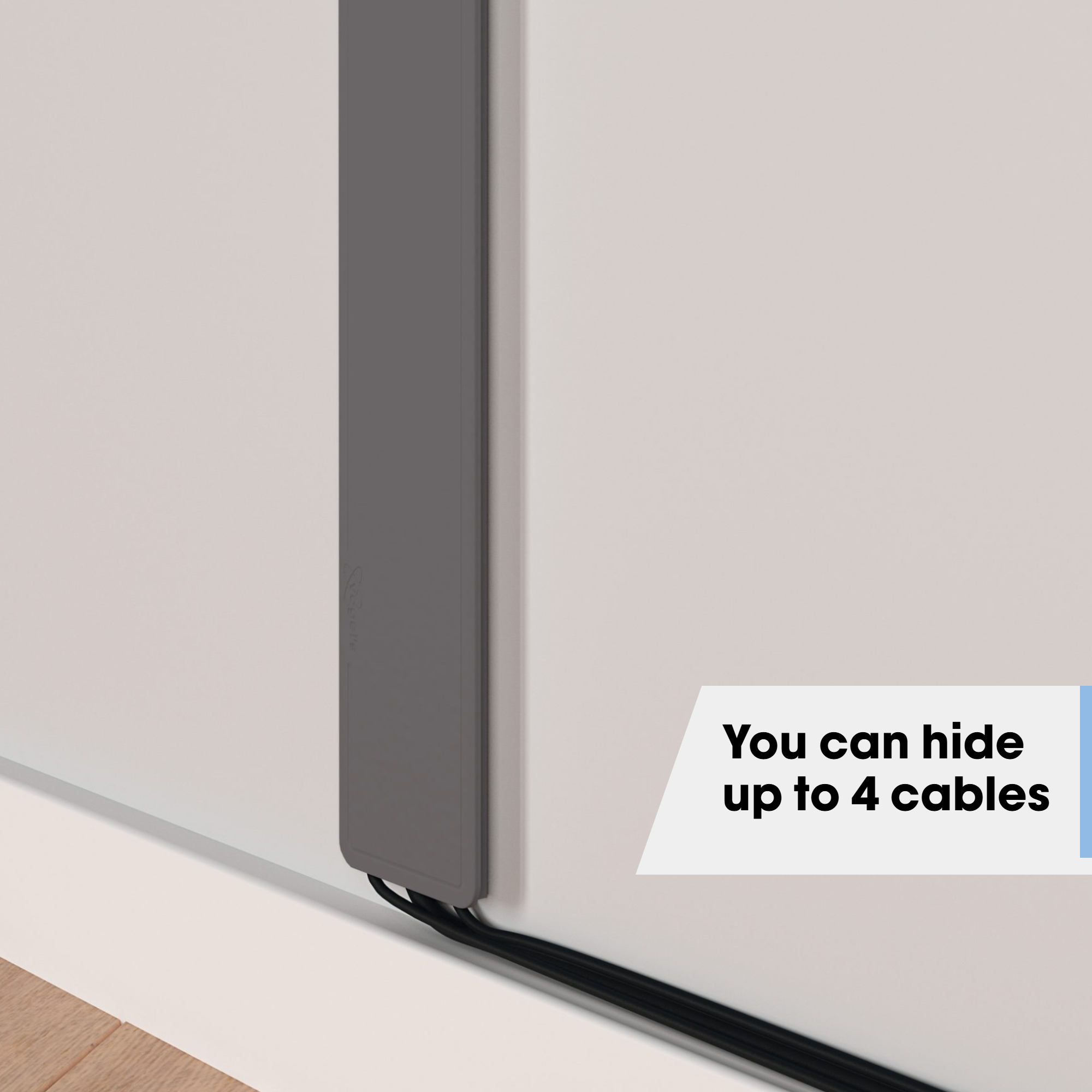 Kabelverstecker an einer weißen Wand. Text sagt: 'Sie können bis zu 4 Kabel verstecken'.