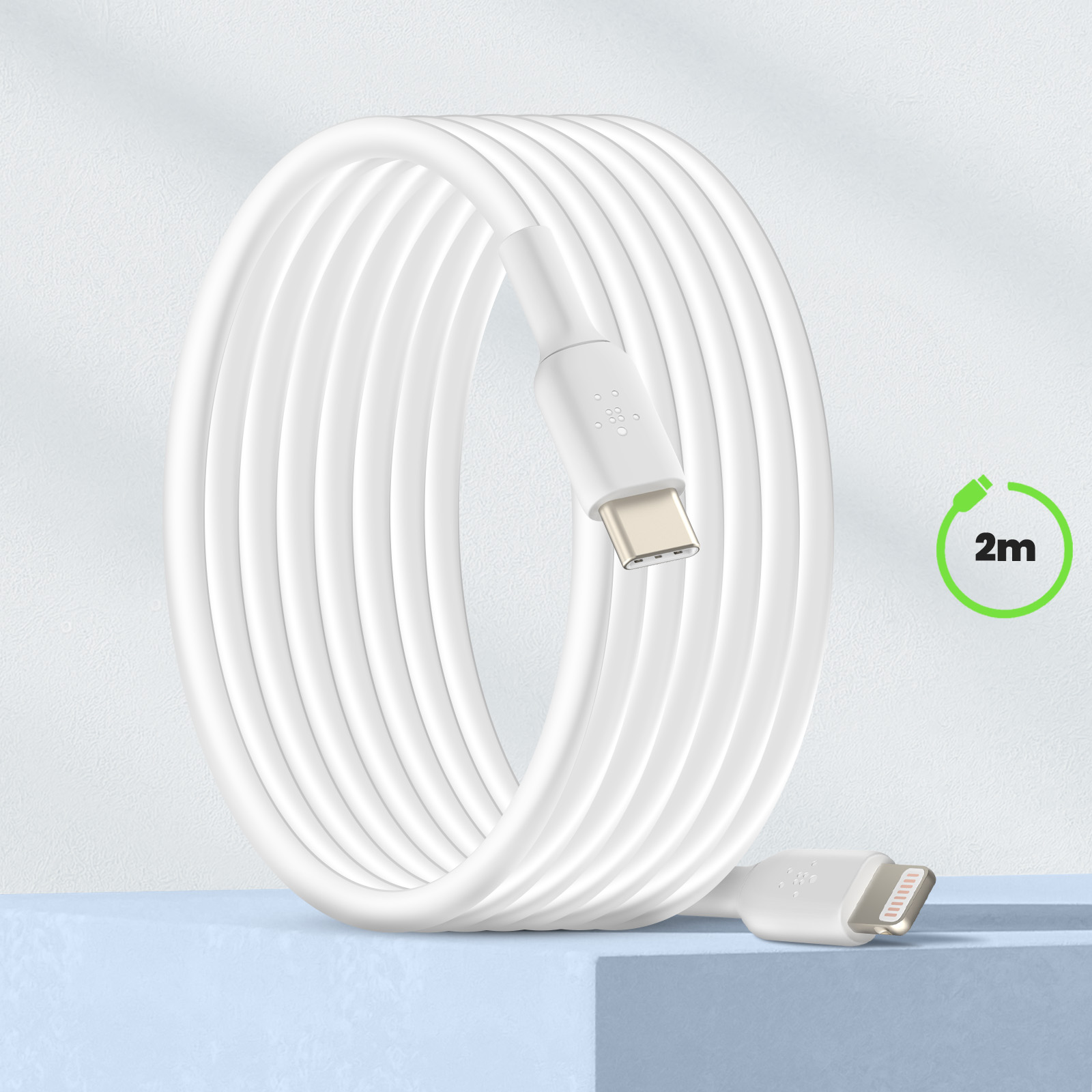 Câble de charge blanc enroulé avec connecteurs USB-C et Lightning, et le texte '2m'.