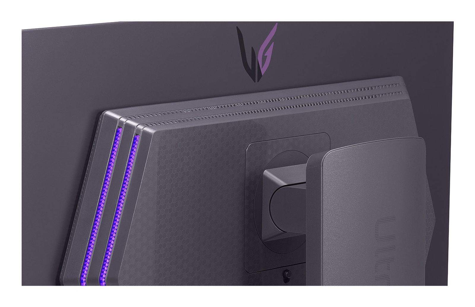 Zbliżenie na tył ciemnoszarego monitora. Fioletowe światła na lewej krawędzi.