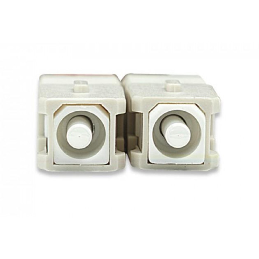 Due connettori in fibra ottica beige su sfondo bianco.