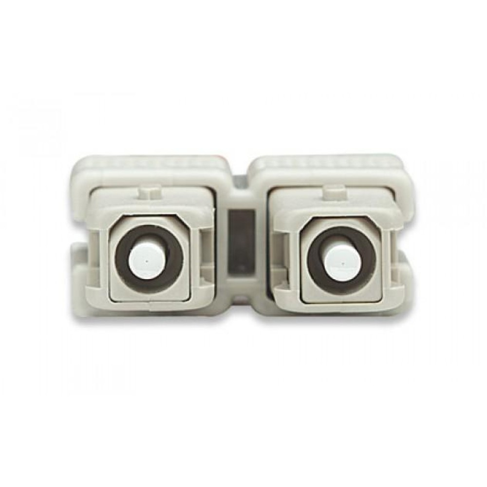 Due connettori in fibra ottica beige affiancati, sfondo bianco.