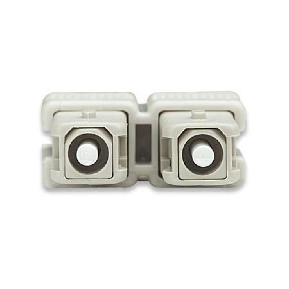 Due connettori in fibra ottica beige su sfondo bianco.