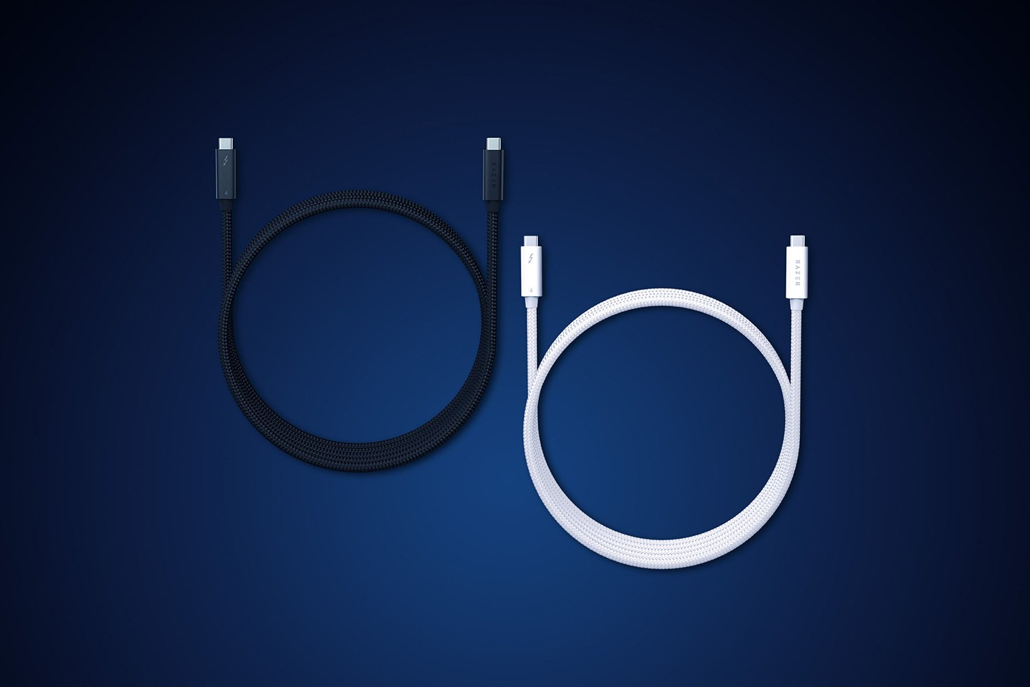 Dwa kable, jeden czarny i jeden biały, oba USB-C, na gradientowym niebieskim tle.