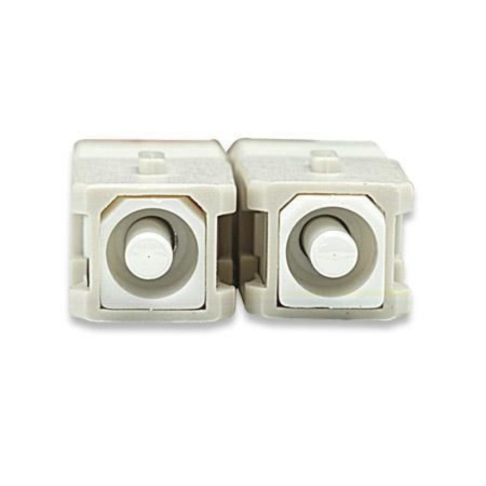 Due connettori in fibra ottica beige affiancati, sfondo bianco.