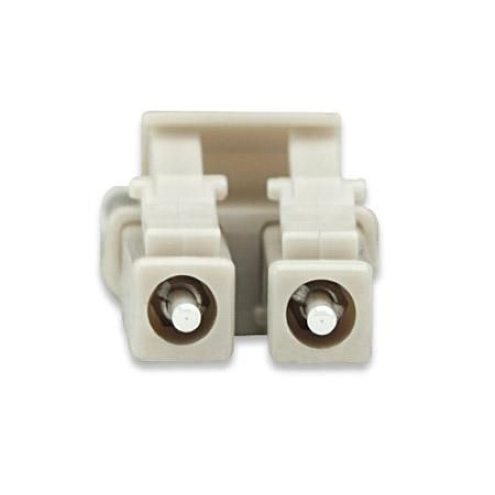 Un connettore in fibra ottica beige con due connettori cilindrici bianchi.