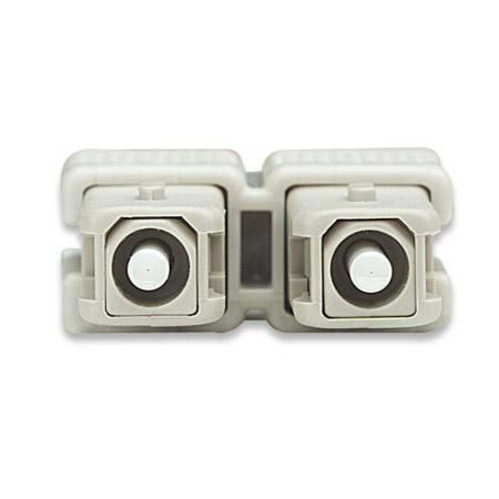 Un connettore in fibra ottica grigio con due porte su sfondo bianco.
