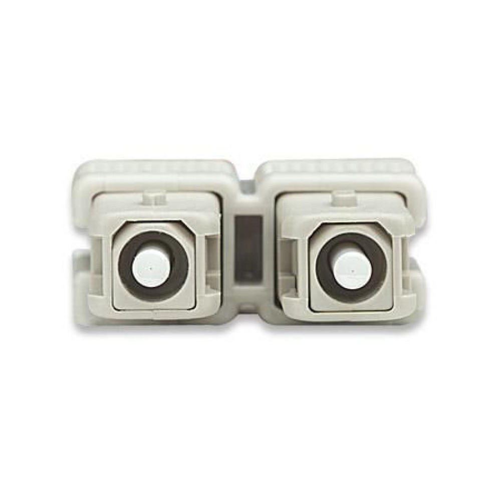Due connettori in fibra ottica beige affiancati. Ognuno ha un interno bianco e un telaio quadrato.