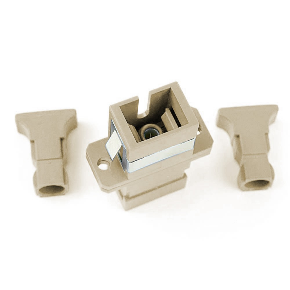 Set di connettori color beige su bianco. Include una parte centrale e due laterali.