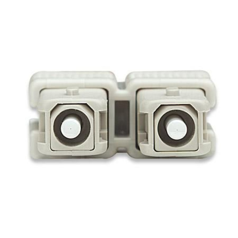 Due connettori in fibra ottica grigio chiaro affiancati su sfondo bianco.