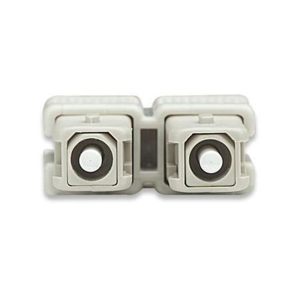 Un accoppiatore in fibra ottica beige con due porte allineate.