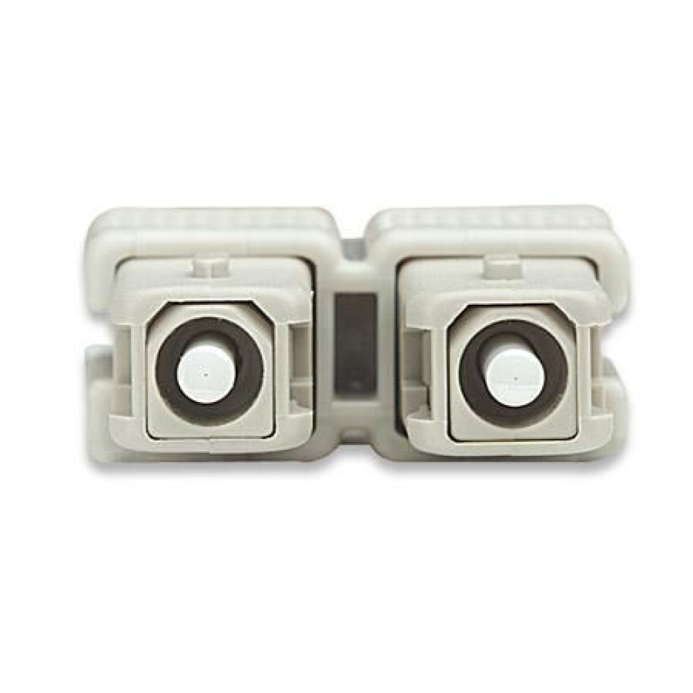 Un connettore in fibra ottica grigio con due porte su sfondo bianco.