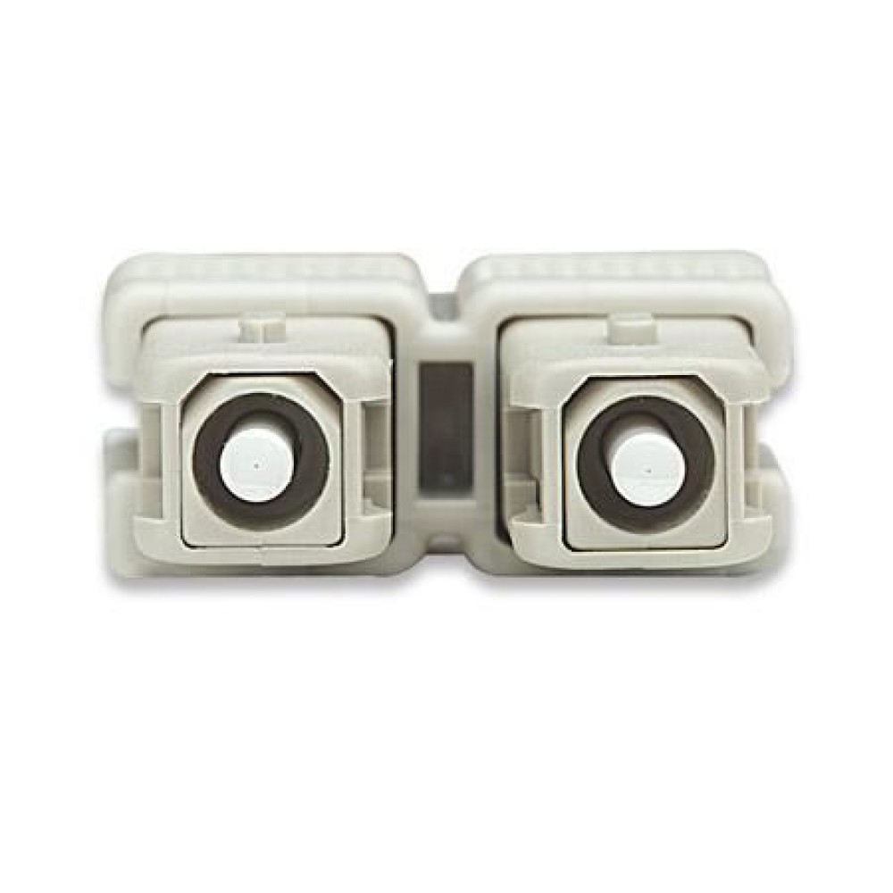 Due connettori in fibra ottica grigio chiaro affiancati su sfondo bianco.