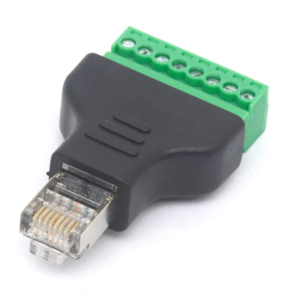 Adattatore nero e verde con connettori RJ45 e morsettiera. Sfondo bianco.