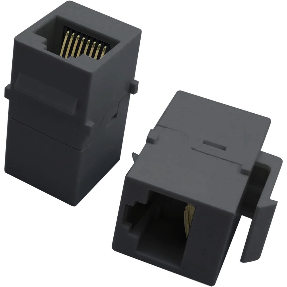 Due accoppiatori RJ45 grigi. Pin dorati visibili. Sfondo bianco.