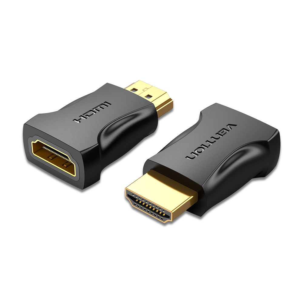 Due adattatori HDMI neri con connettori dorati su superficie bianca.
