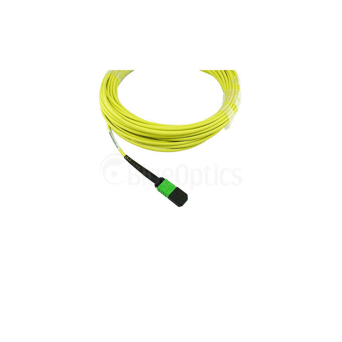 Cavo in fibra ottica giallo con connettore nero e verde. Il cavo è arrotolato.