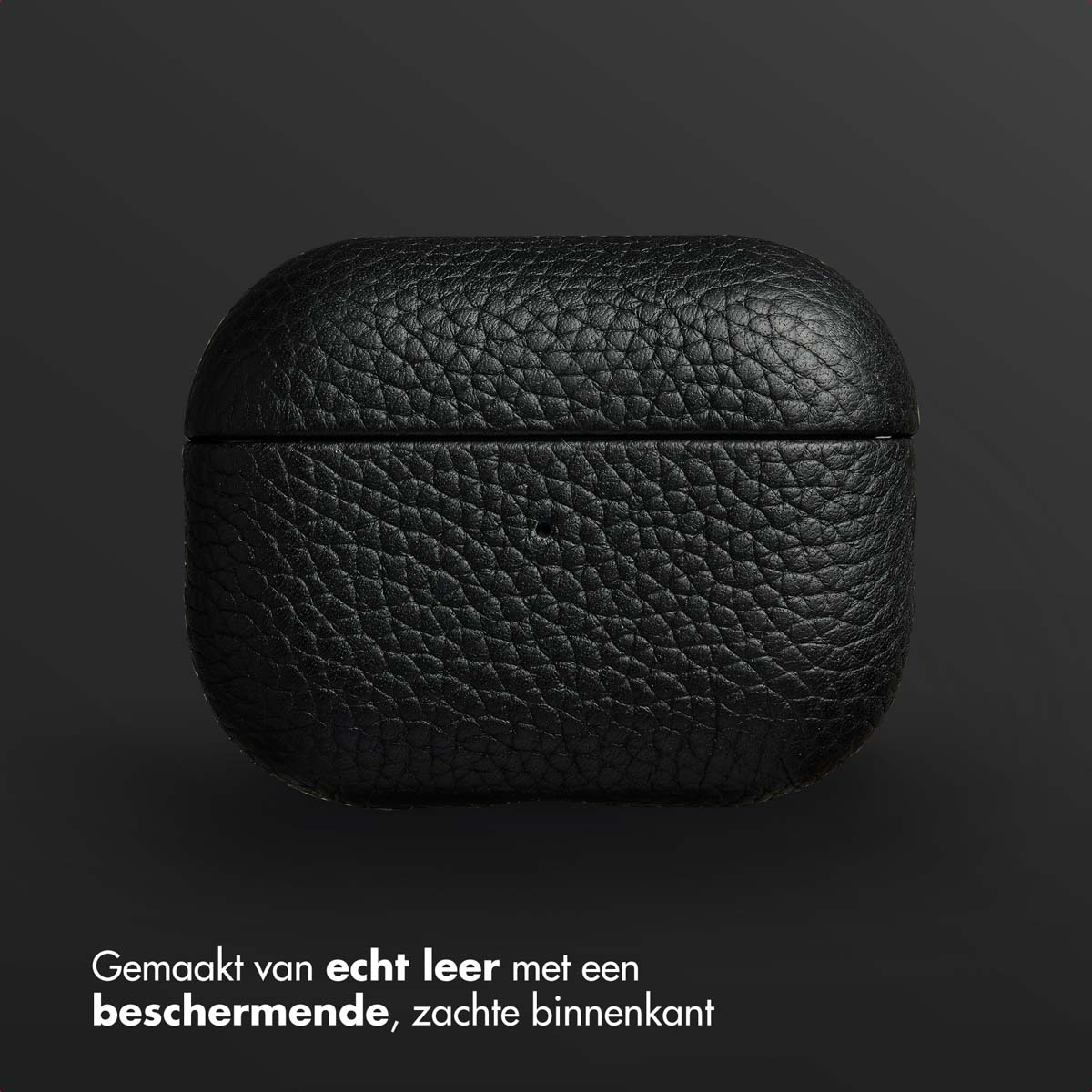 Black earbud case. The case is leather and has a soft interior. The background is a dark gray.