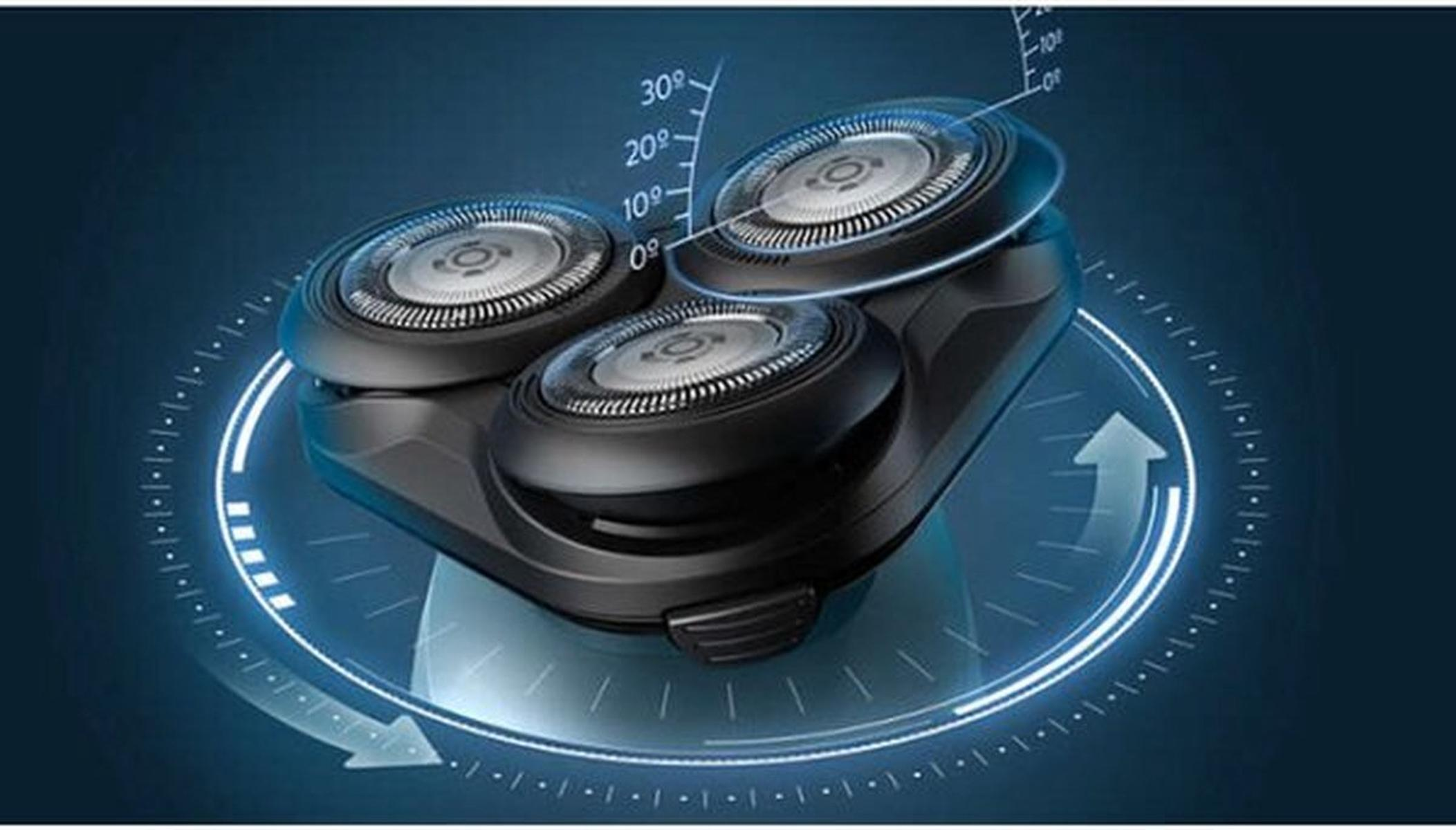 Electric shaver head with three rotating blades, with angles indicated by lines and numbers.