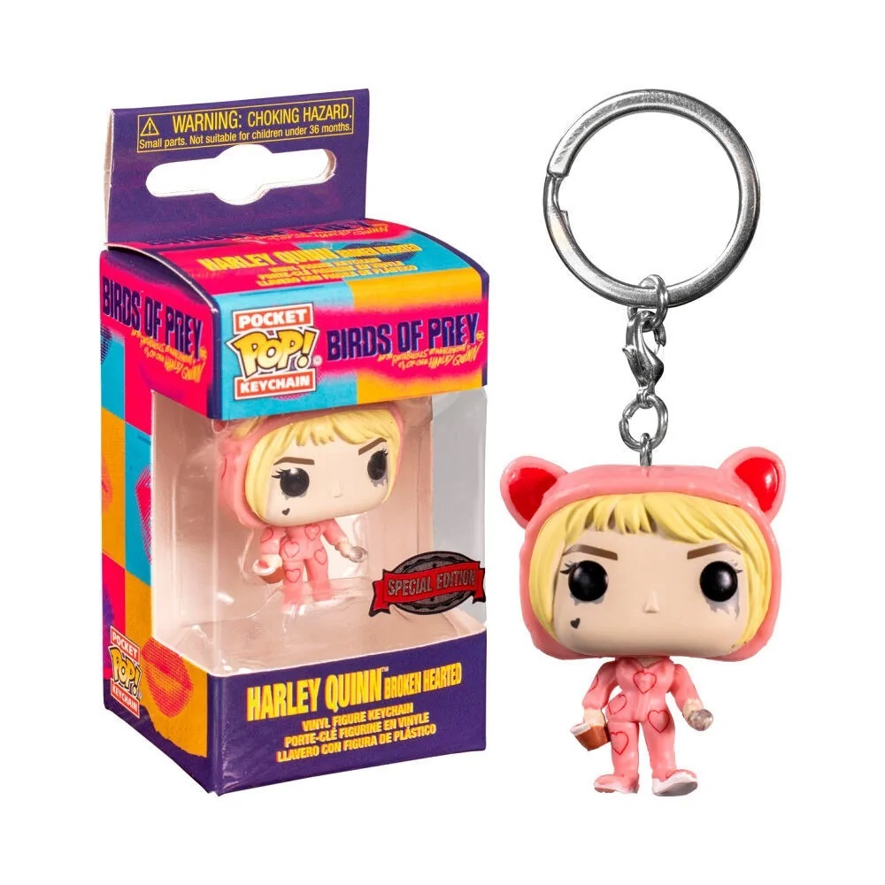 Eine Harley Quinn Schlüsselanhängerfigur in einer Box, mit der Figur außerhalb der Box.