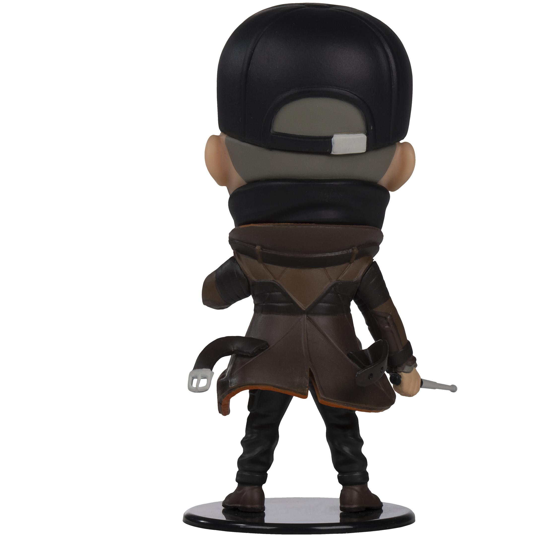 R ückansicht einer kleinen Actionfigur mit schwarzer Kappe und brauner Jacke.