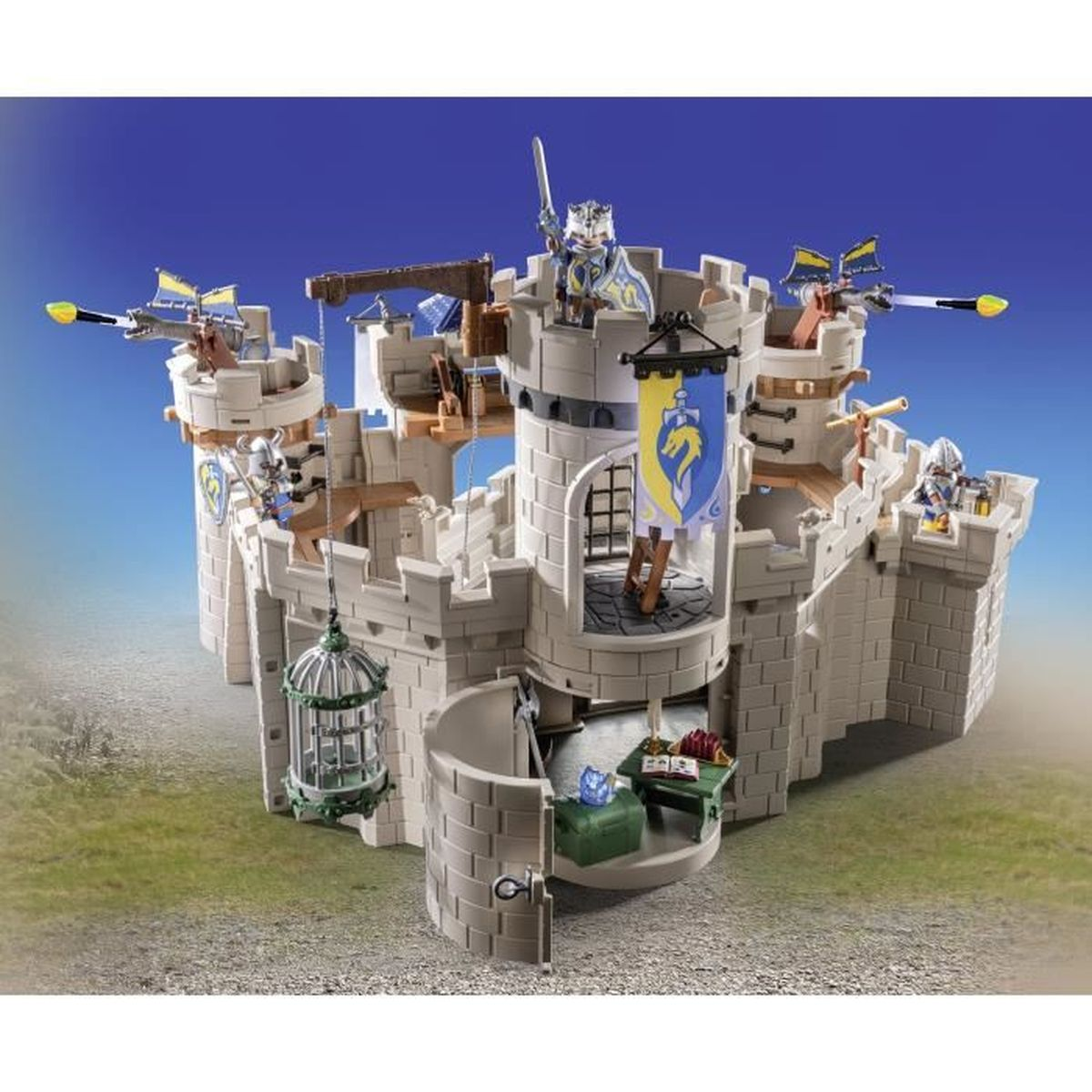 Castello giocattolo bianco con cavalieri e bandiere. Ponte levatoio e gabbia.