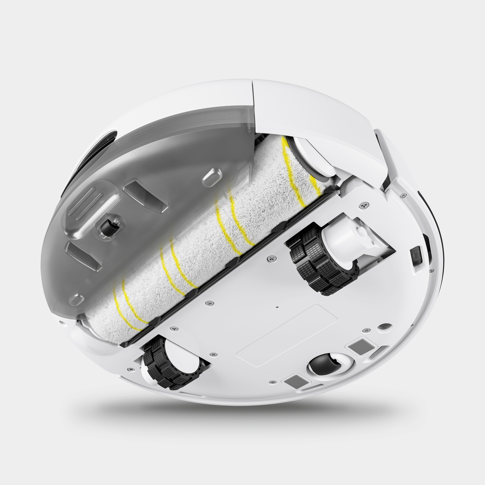 Roboter-Staubsauger von unten. Er hat einen weißen Körper und schwarze Räder.