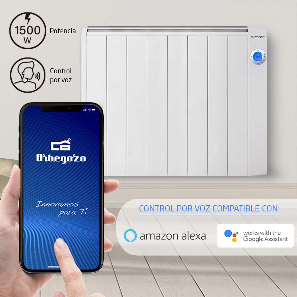 Biały grzejnik elektryczny Orbegozo z telefonem pokazującym sterowanie aplikacją, na białej ścianie.