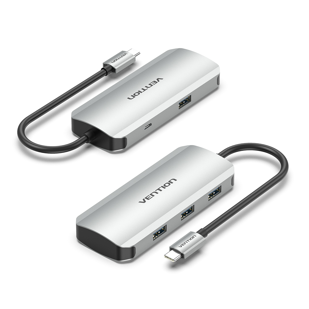 Due hub Vention argentati con porte USB e cavi USB-C collegati.