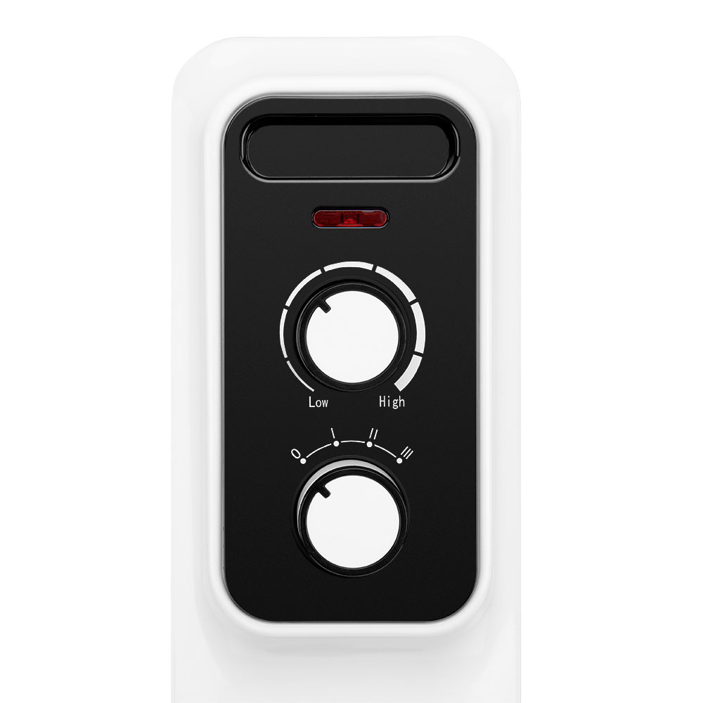 Zbliżenie panelu sterowania grzejnika, z dwoma pokrętłami i czerwoną lampką.