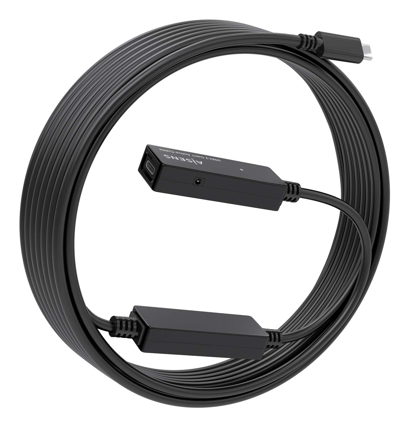 Cavo USB-C nero arrotolato. Ha due connettori neri. Il cavo è su una superficie bianca.