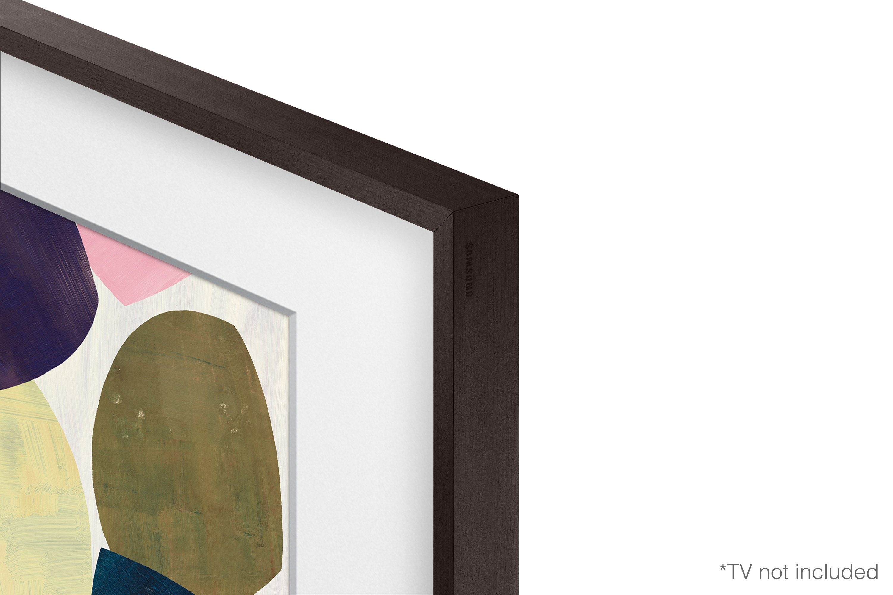Primer plano de la esquina de una obra de arte enmarcada. Muestra formas abstractas. Marco marrón.