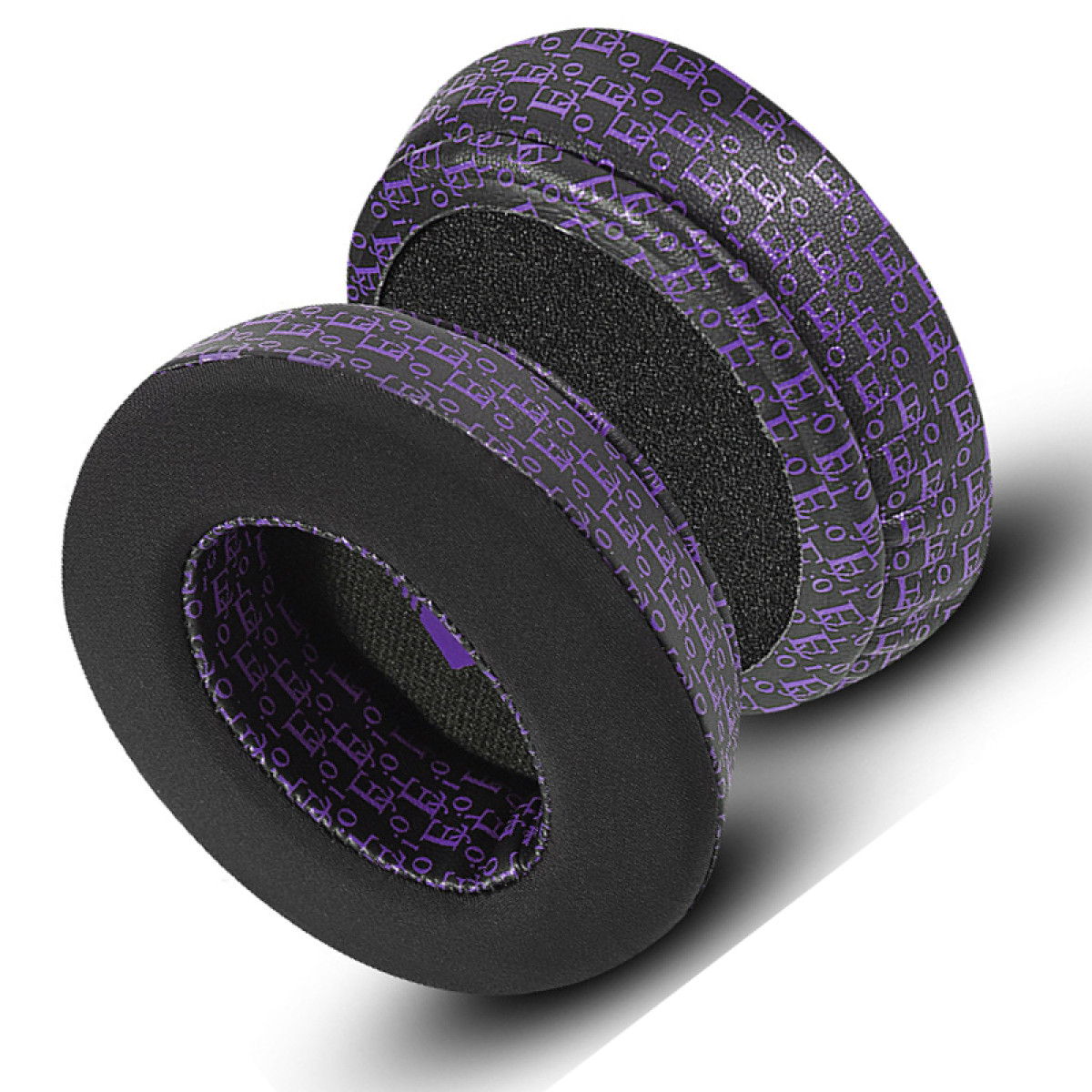 Cuscinetti auricolari viola fantasia per cuffie, schiuma nera visibile.