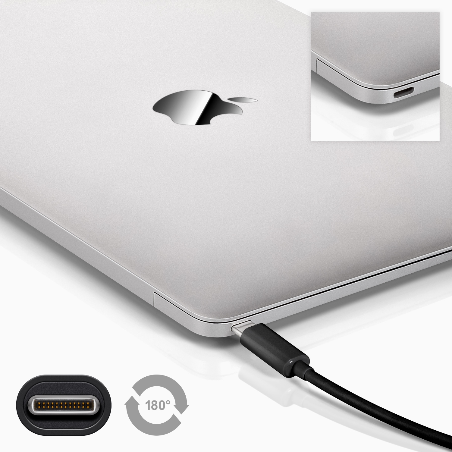 Laptop with a USB-C cable. Silver laptop with black cable. White background.